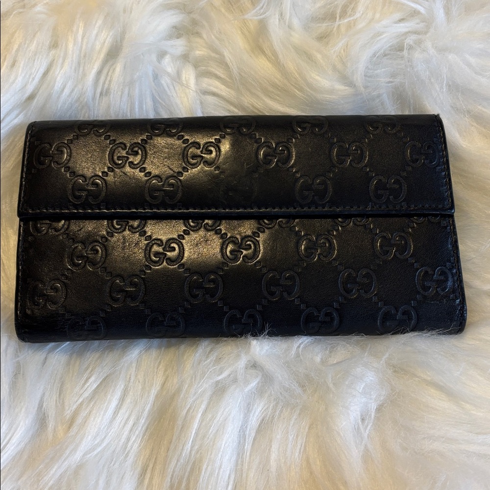 Authentic Gucci Black Embossed Monogram Wallet